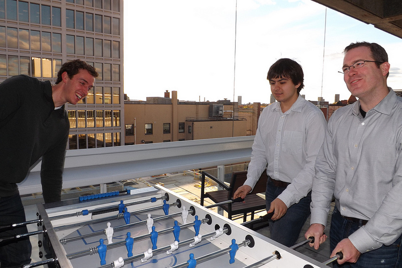 BITS team playing foosball in Cambridge